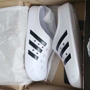 Adidas clogs, black and white. New with tags
